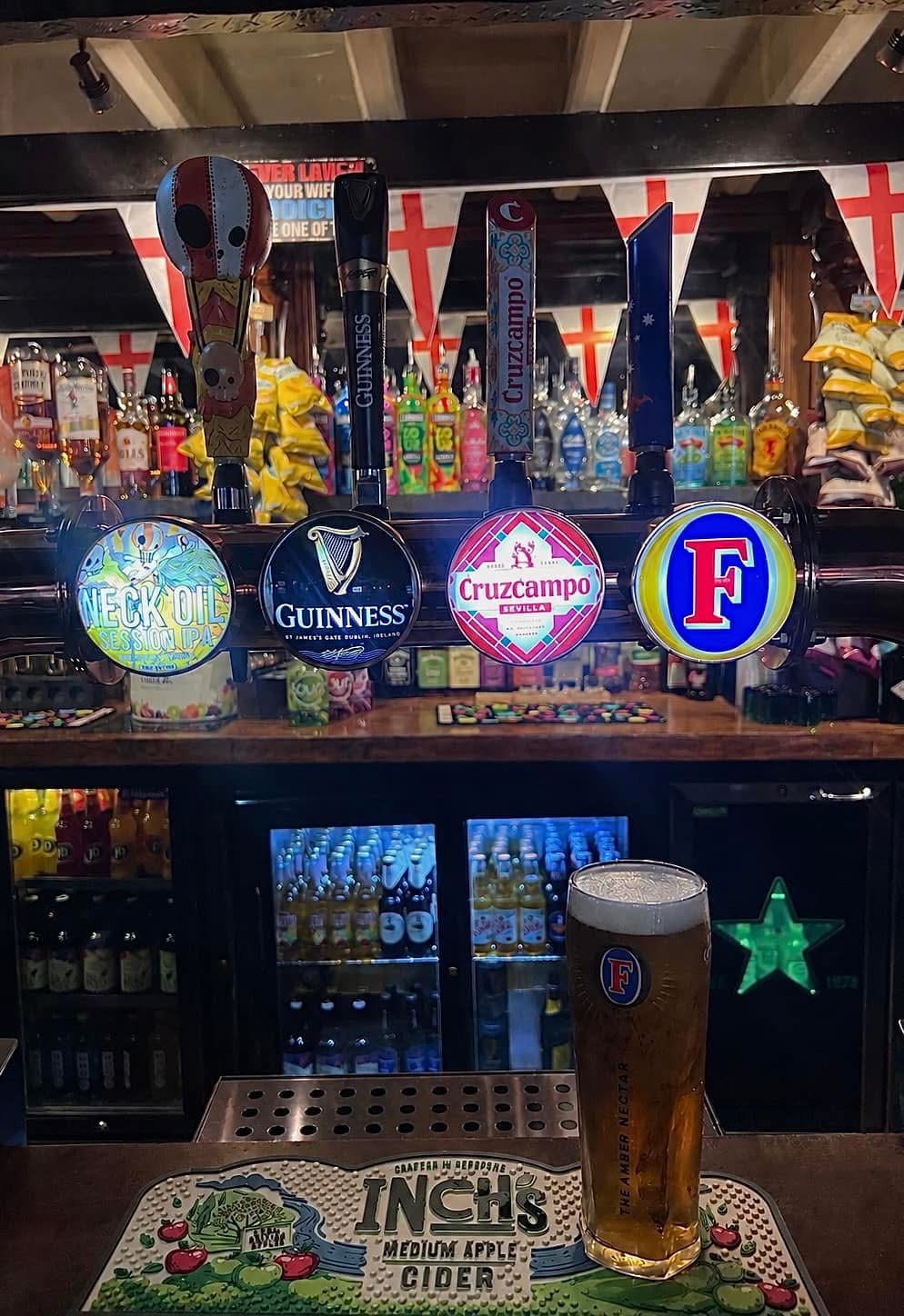 A freshly pulled pint at The Ships Tavern bar